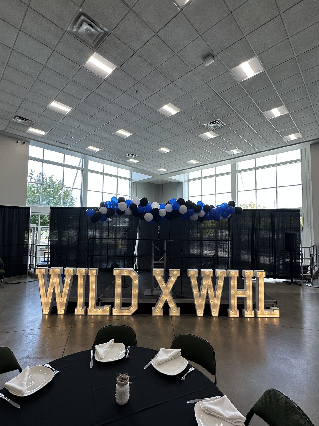 Wenatchee Wild WHL hockey corporate event with tent and furniture rentals