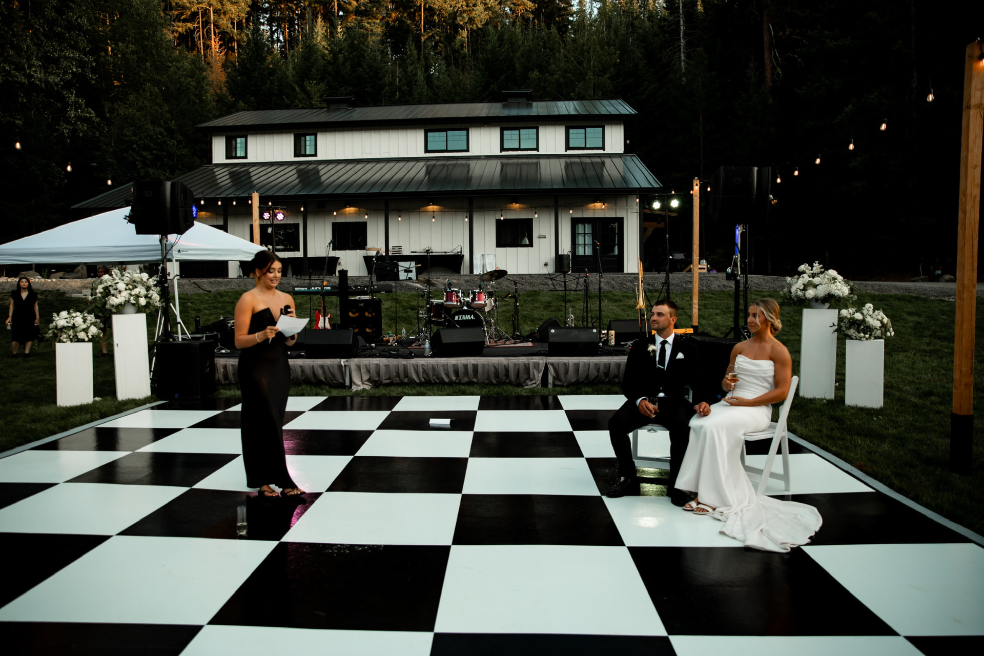 Checkered dance floor rental outside the barn at White Barn Retreats in upper Kittitas County, Washington