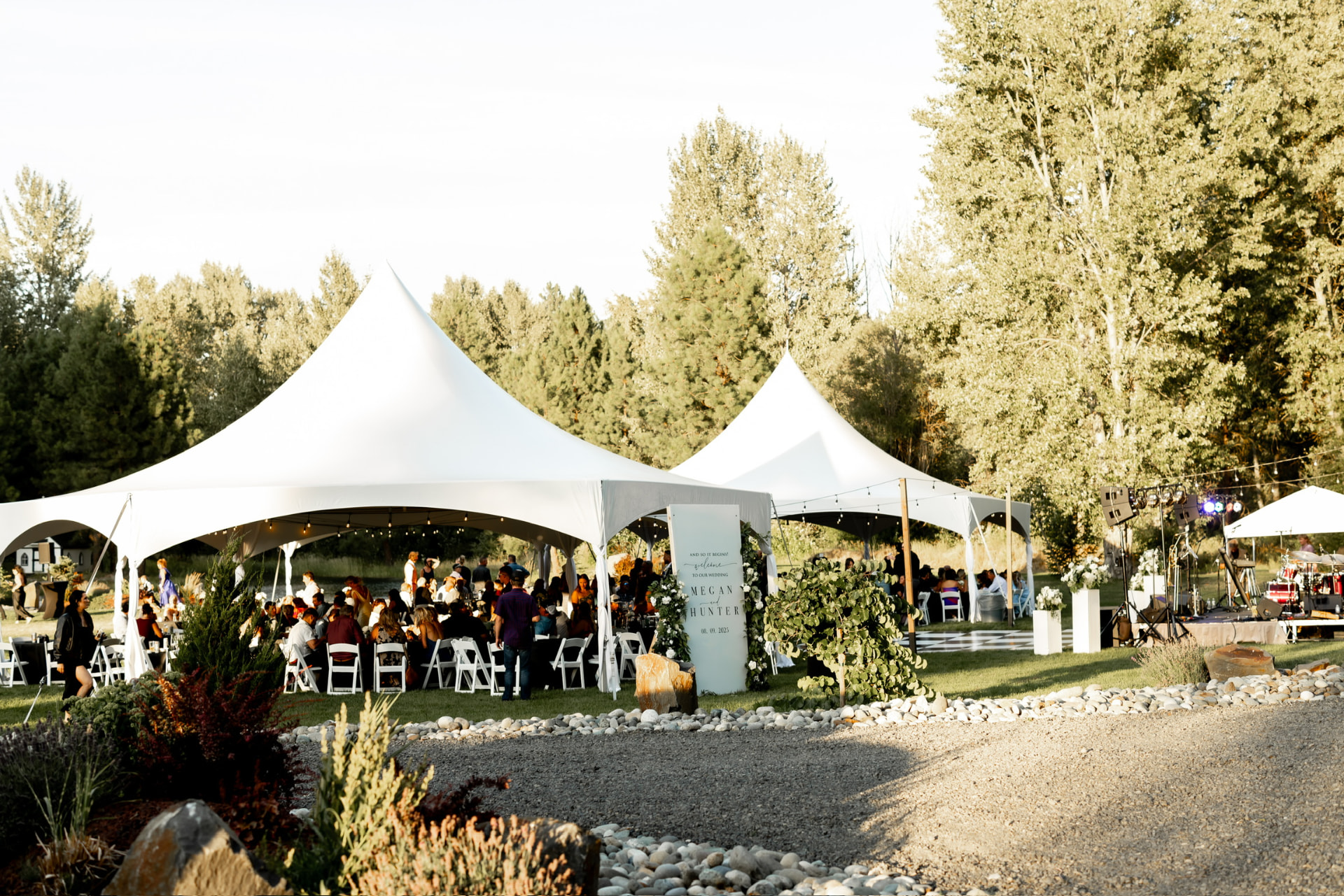 White marquee tent rental with catering setup at an Eastern Washington event