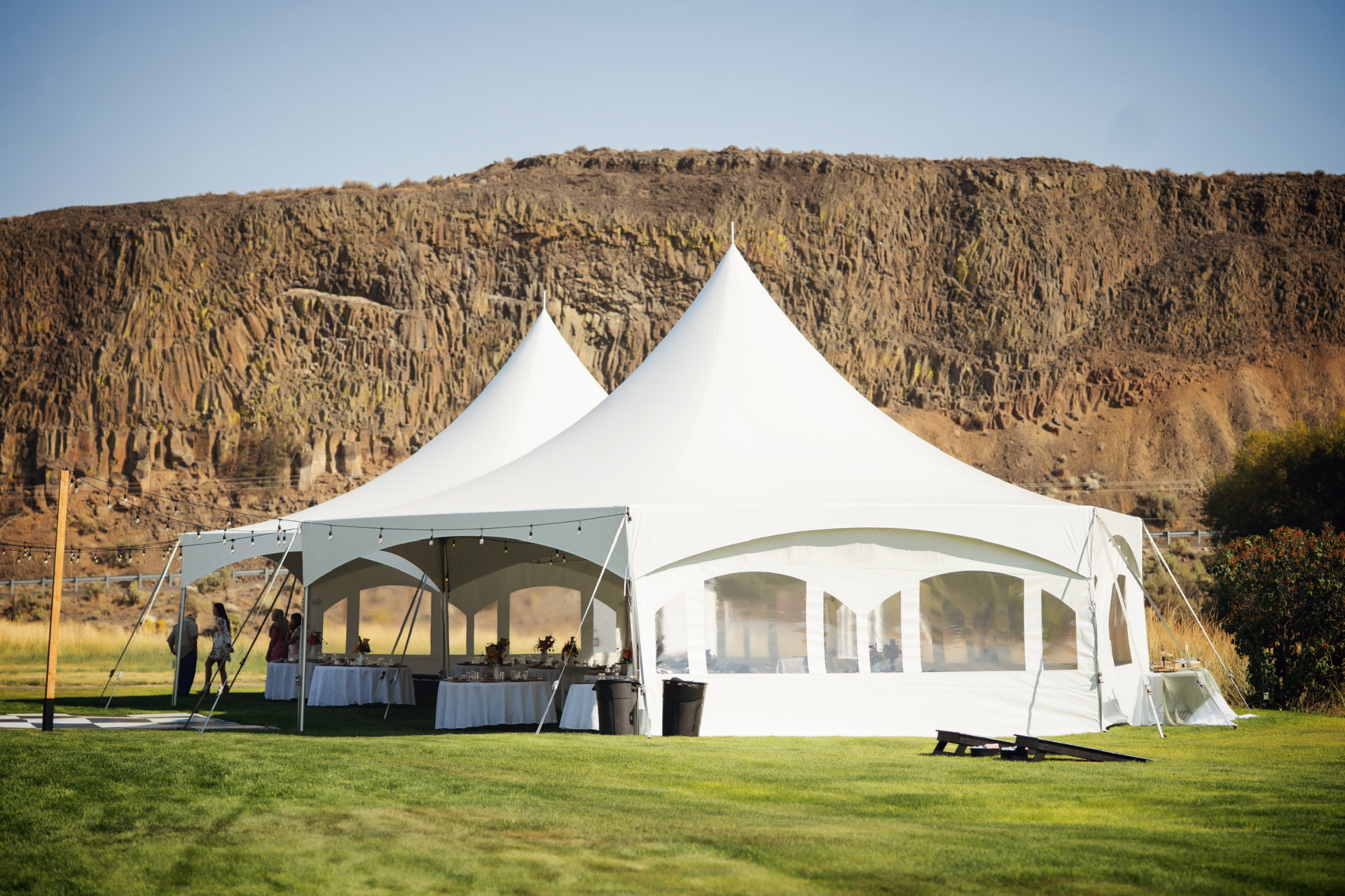 Clearspan tent rental installed on a lawn for an Eastern Washington celebration
