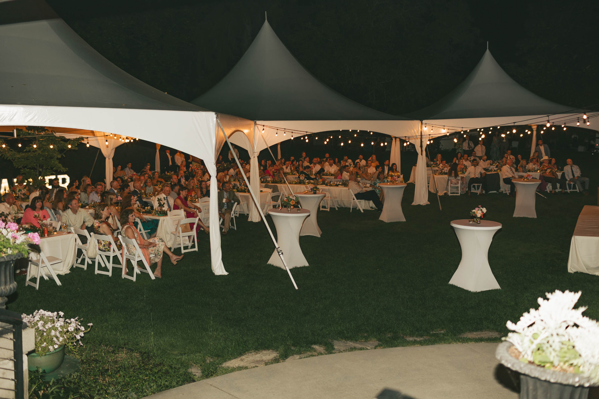 Tent rental with lighting installed for an evening event in Eastern Washington